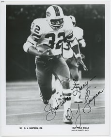 Vintage Sports Still Photo Autographed O. J. SIMPSON Football