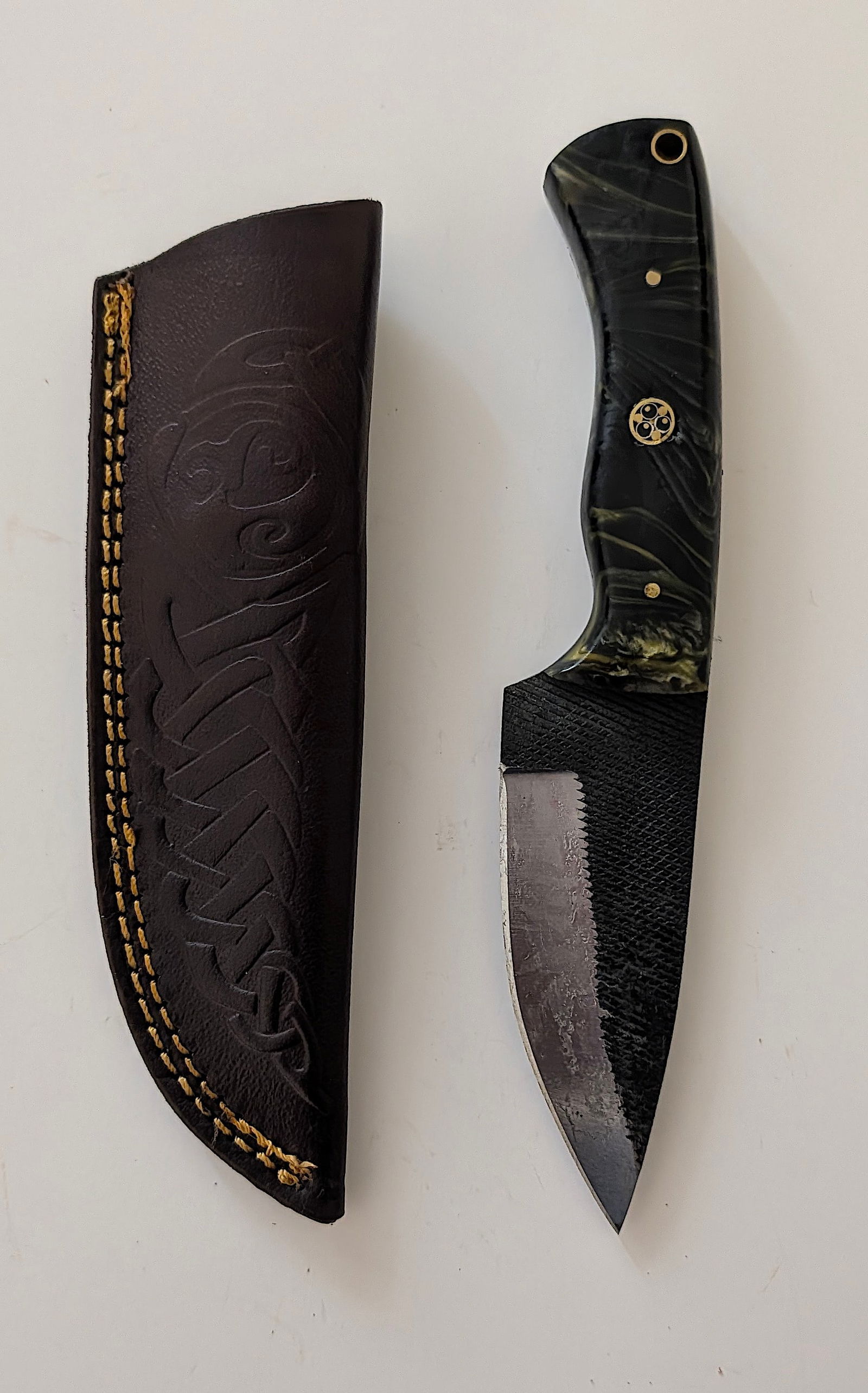 Handcrafted Heirloom Damascus Steel Knife with Leather Sheath OPP!: These aren't your average factory-made knives. Each handmade damascus knife is a unique work of art, forged with time-honored techniques and the skill of a dedicated craftsperson. The distinctive laye