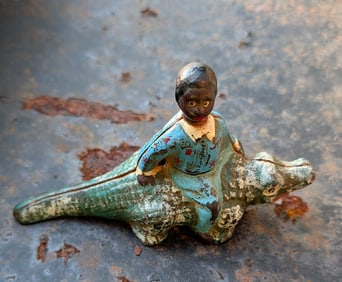 Americana Collectible Antique Cast Iron Figurine Boy Riding an Alligator
