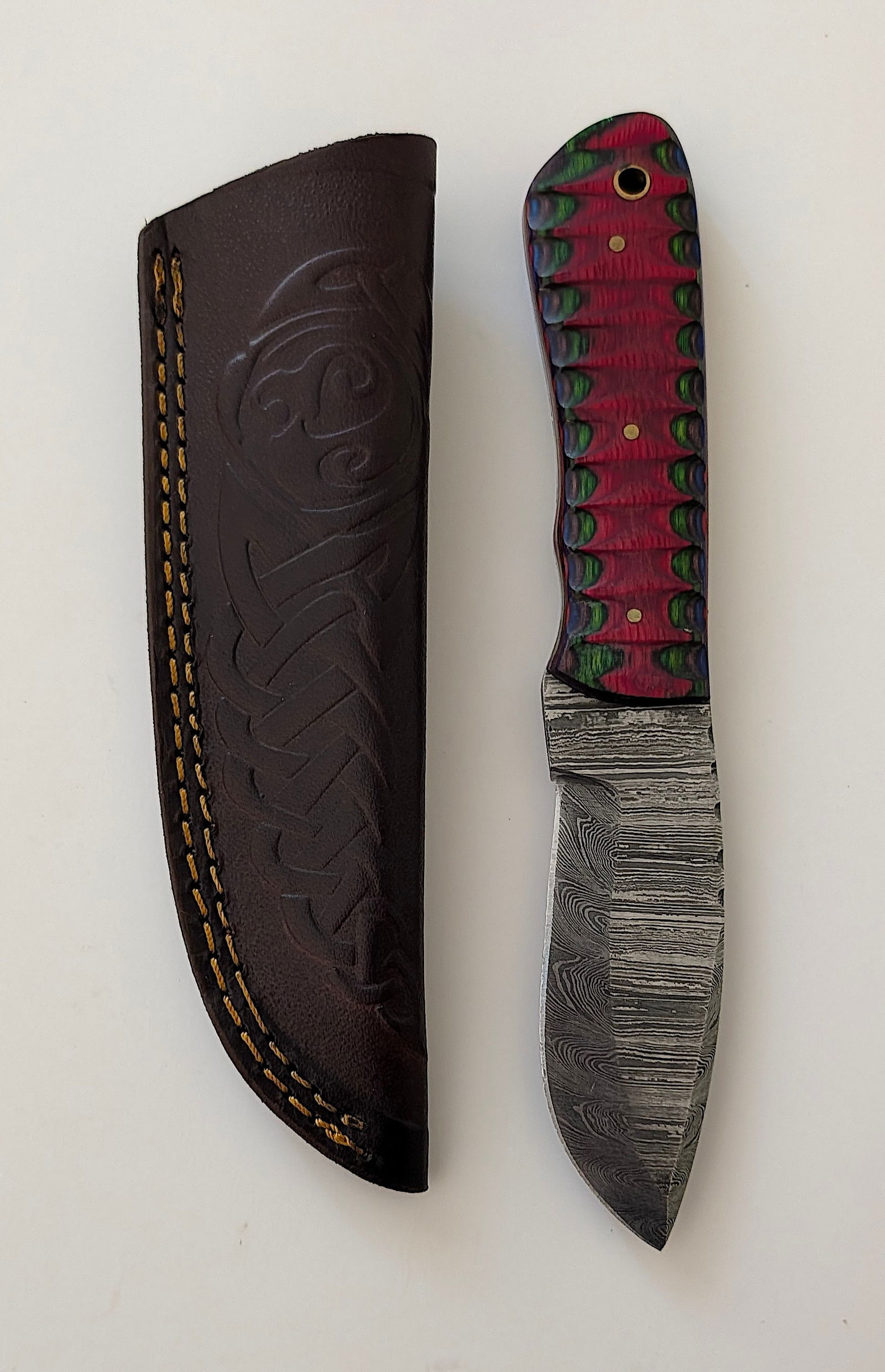 Handcrafted Heirloom Damascus Steel Knife with Leather Sheath OPP!: These aren't your average factory-made knives. Each handmade damascus knife is a unique work of art, forged with time-honored techniques and the skill of a dedicated craftsperson. The distinctive laye