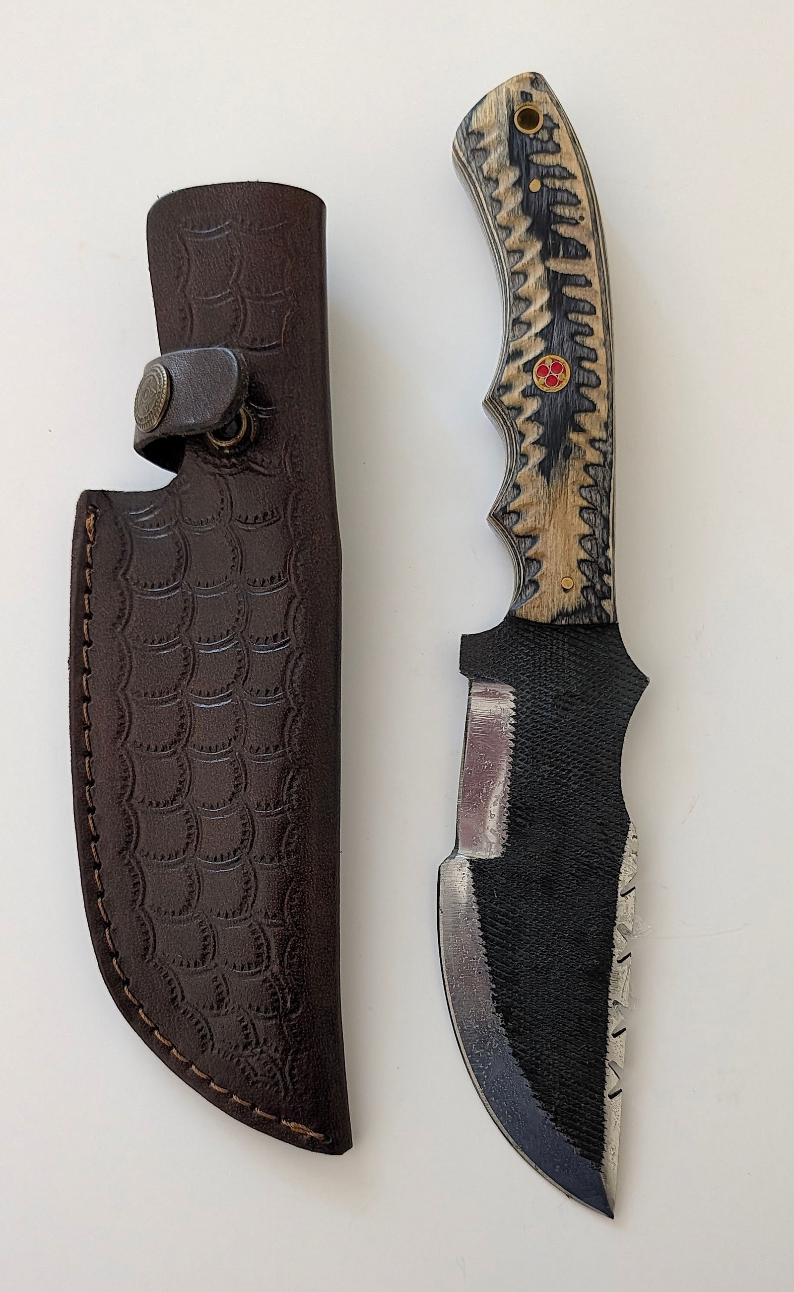 Handcrafted Heirloom Damascus Steel Knife with Leather Sheath OPP!: These aren't your average factory-made knives. Each handmade damascus knife is a unique work of art, forged with time-honored techniques and the skill of a dedicated craftsperson. The distinctive laye