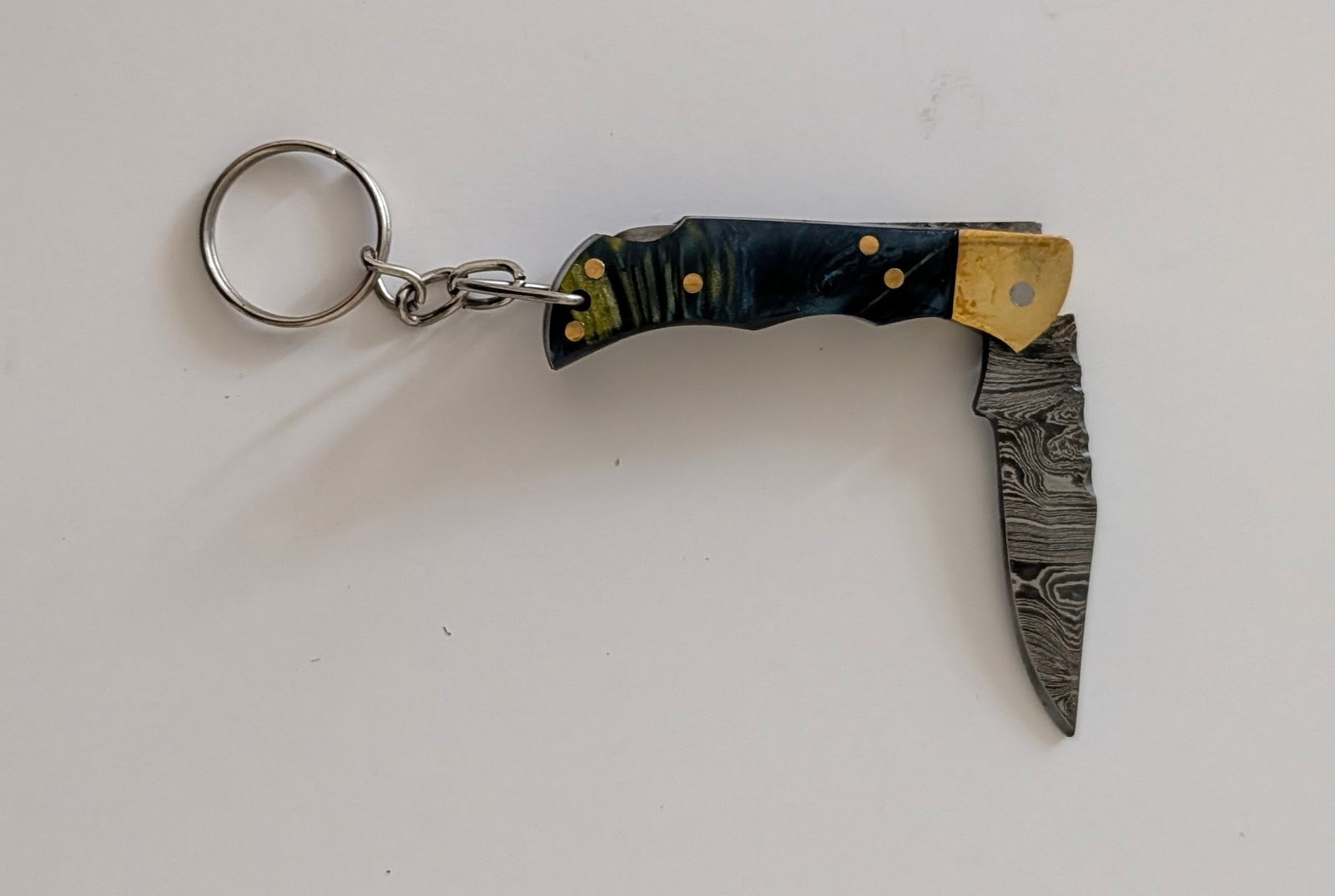 Handcrafted Heirloom Damascus Steel Knife with Leather Sheath OPP!: These aren't your average factory-made knives. Each handmade damascus knife is a unique work of art, forged with time-honored techniques and the skill of a dedicated craftsperson. The distinctive laye