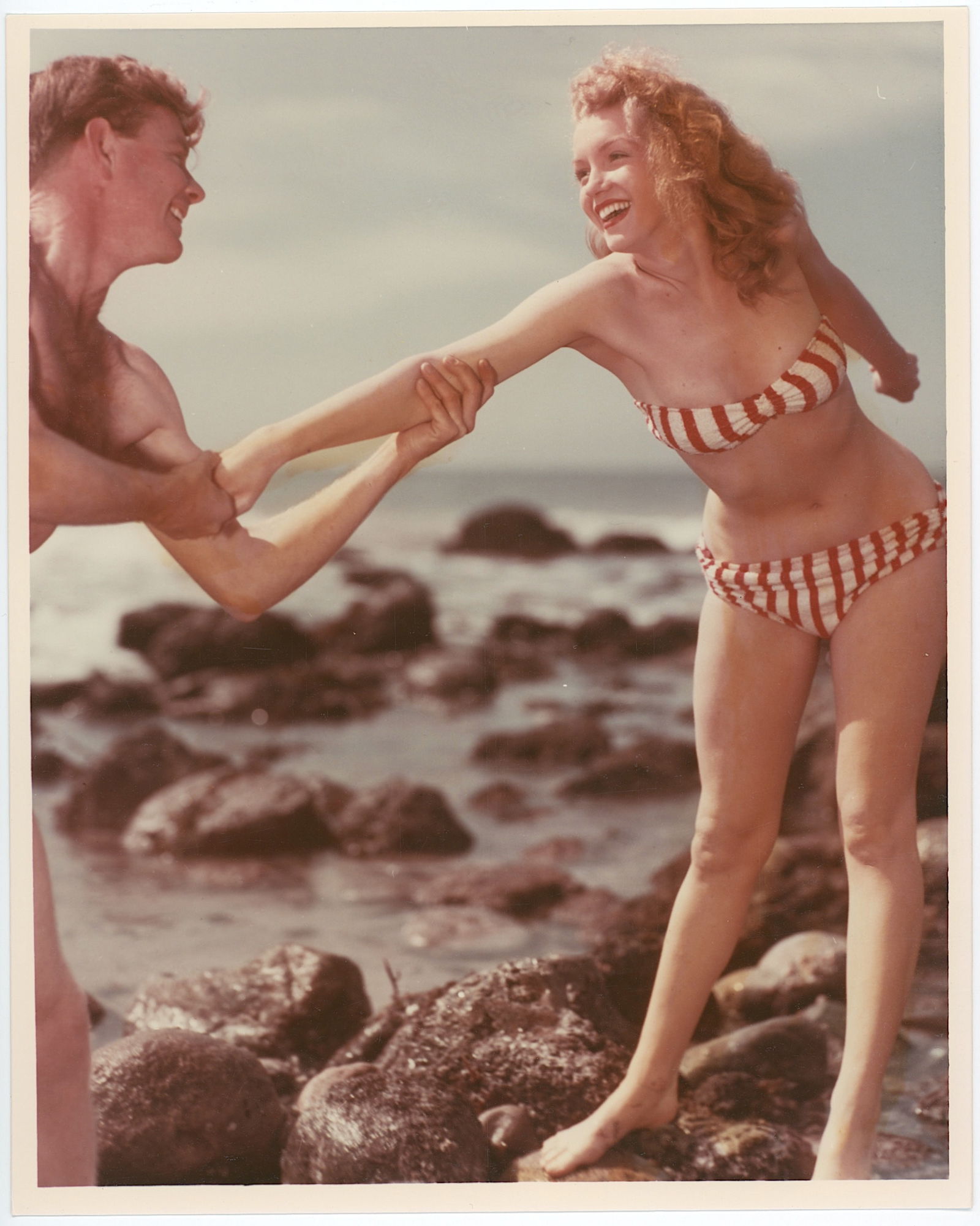 MARILYN MONROE with French Bikini by Laszlo Willinger, 1947: Printed in 1980s. The dimensions of this original Kodak paper printed photograph are Approx. 10" x 8" (variances can occur). This lot is located in Boca Raton, Fl and its shipment will be made directl