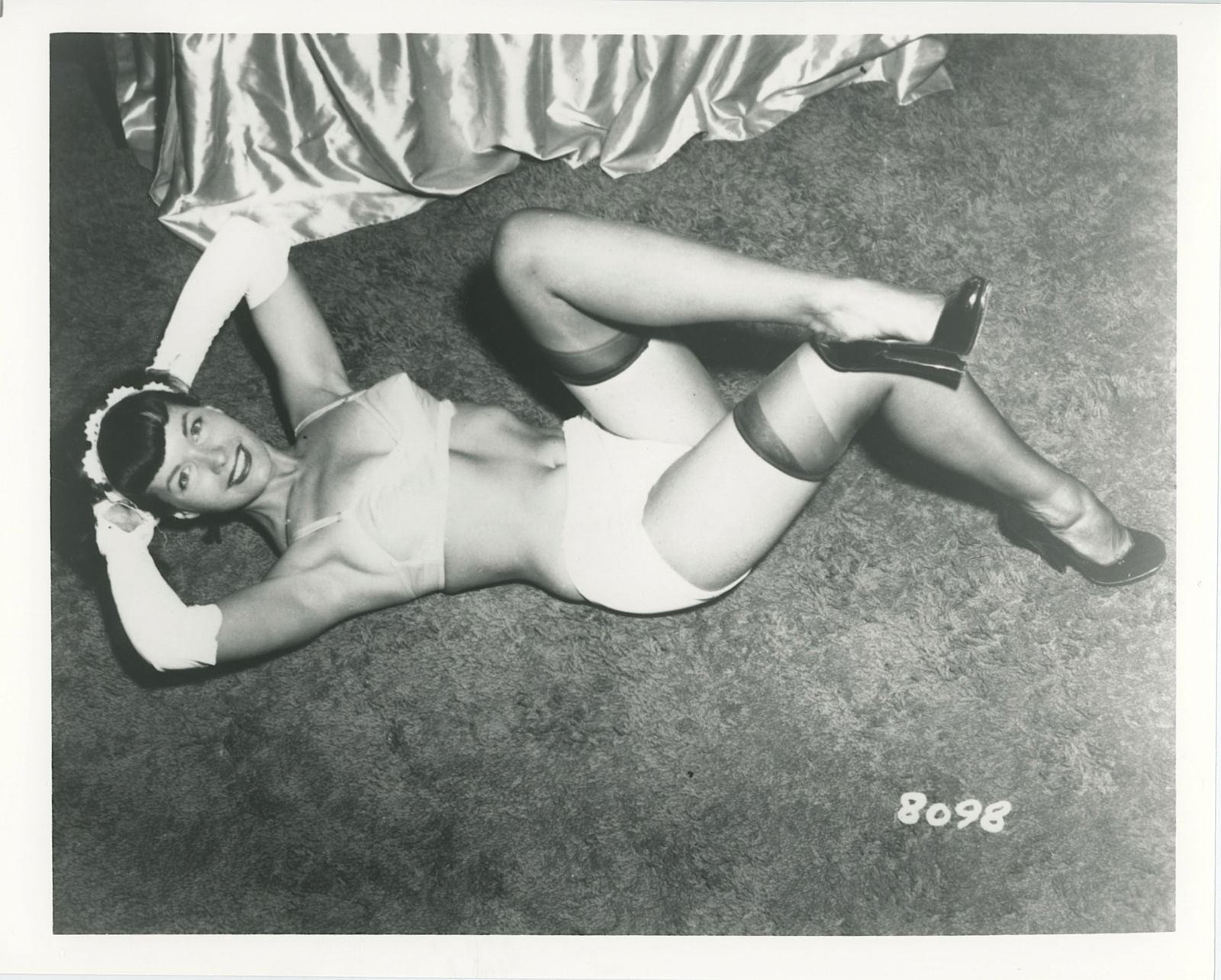 Vintage Photograph Pin-Up Model BETTIE PAGE by Irving Klaw: This lot is coming from the estate of a collector in RI. We have included a quality scan to show it's actual condition. The dimensions are Approx. 10" x 8". This lot is located in Boca Raton, Fl and i