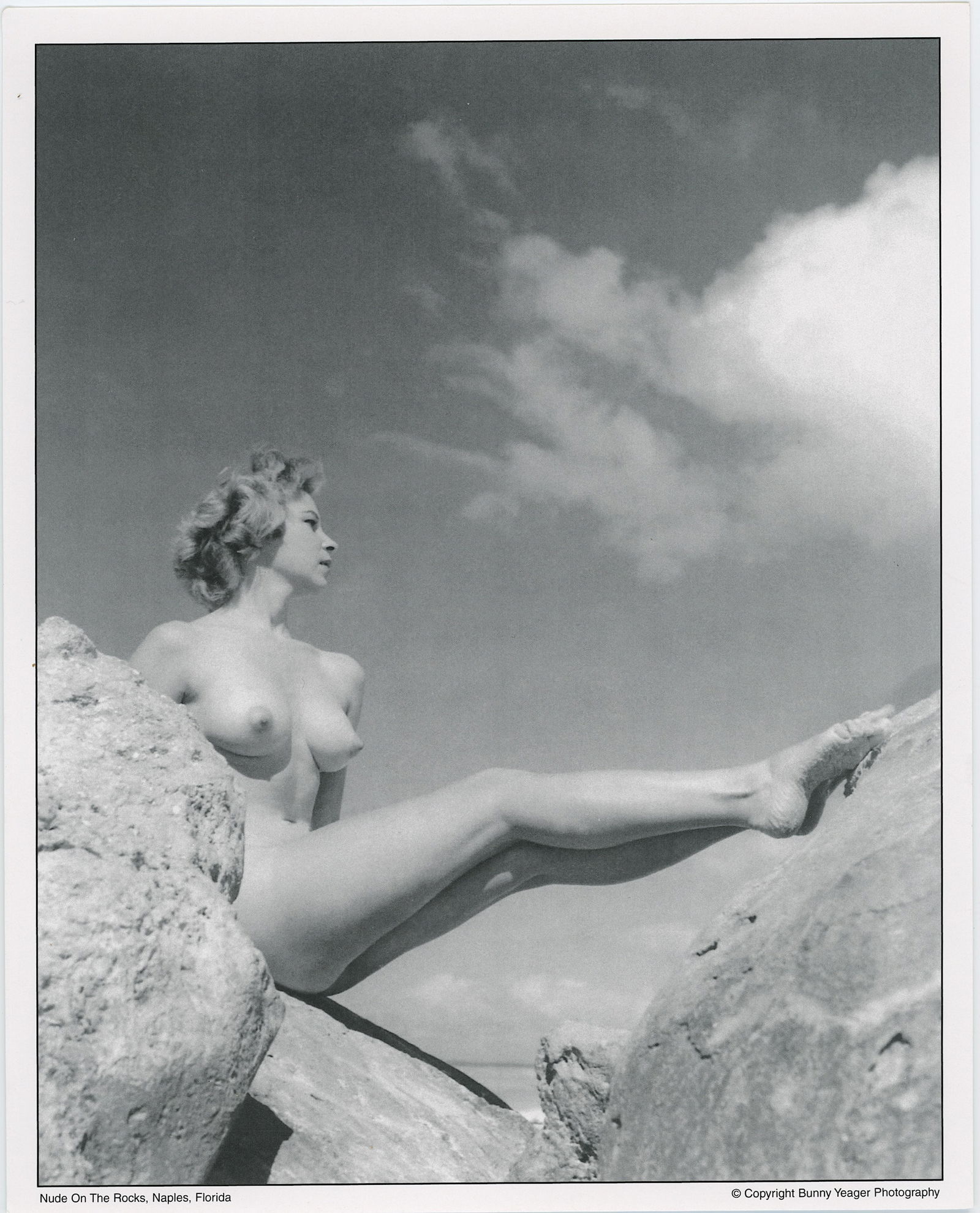BUNNY YEAGER Vintage Pin Up Litho Model NUDE ON THE ROCKS: This lot is consigned by a collector in RI. The provenance is from Bunny Yeager's estate/archives. Linnea Eleanor "Bunny" Yeager (March 13, 1929 - May 24, 2014) was an American photographer and pin-up