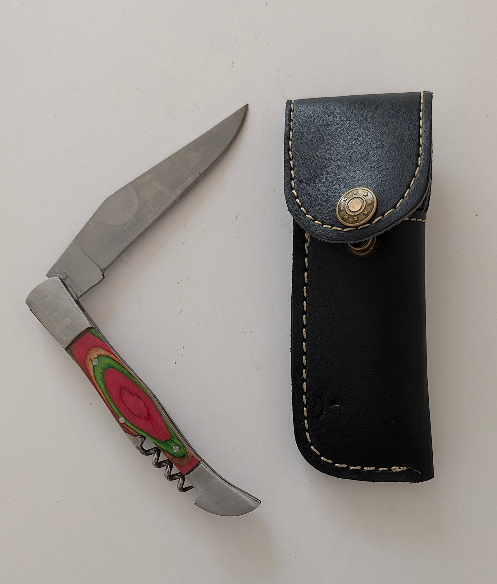 Handcrafted Heirloom Damascus Steel Knife with Leather Sheath OPP!: These aren't your average factory-made knives. Each handmade damascus knife is a unique work of art, forged with time-honored techniques and the skill of a dedicated craftsperson. The distinctive laye