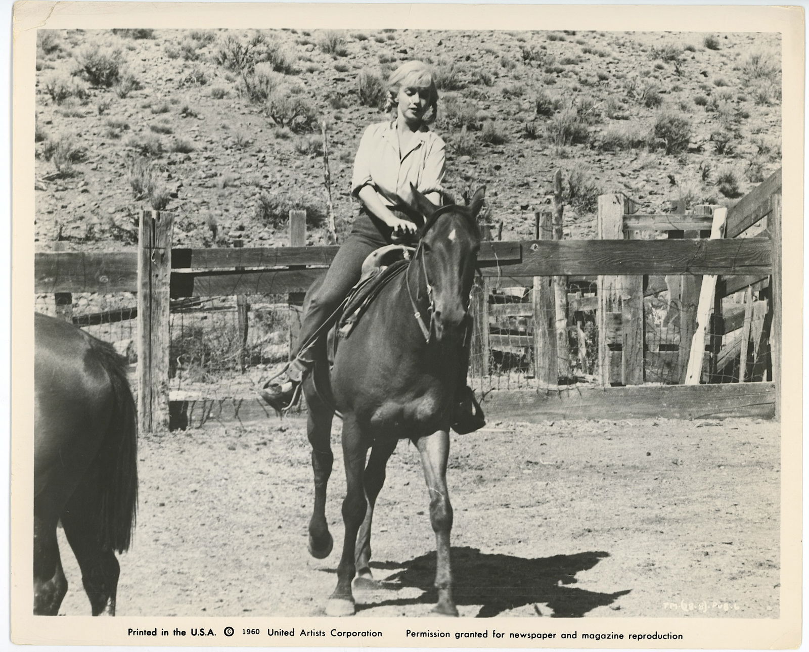 MARILYN MONROE Riding Horse Film "The Misfits", 1961: Vintage movie still featuring actress Marilyn Monroe riding a horse during the production of the 1961 film The Misfits. The dimensions are Approx. 10" x 8". We have included quality images to show it'