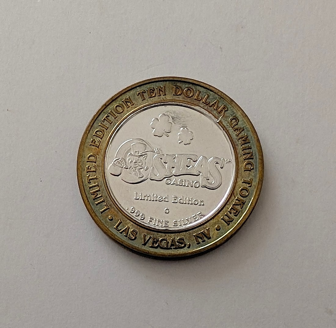 O'Sheas Casino Las Vegas Ltd. Ed. $10 Gaming Silver Token: It is a collectible "Silver Strike" token, which were popular in Las Vegas casinos. The center is made of .999 fine silver. It has approximately 0.6 troy oz .999 Silver and the vintage design can be r