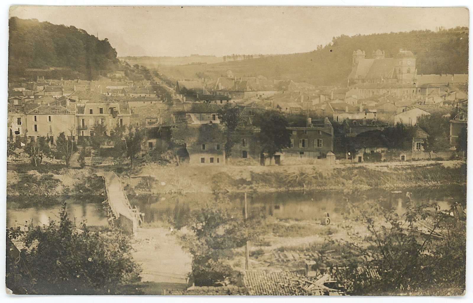 RPPC Historic Destruction Dinant, Belgium in 1914: Vintage postcard depicts a scene of destruction in the town of Dinant, Belgium, along the Meuse River during World War I in 1914. Collectible from the inventories of Artelisted. All the items purchase