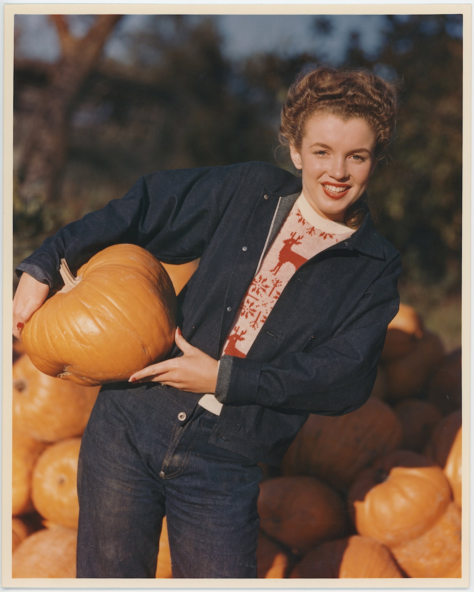 ANDRE DE DIENES Photograph of MARILYN MONROE, Pumpkin Patch, 1945: Stamped and Printed in 1980s. The provenance of this photo is from the estate/archives of notable photographer André de Dienes (Hungarian 1913 - 1986) in CA. André de Dienes is a well-known photogra