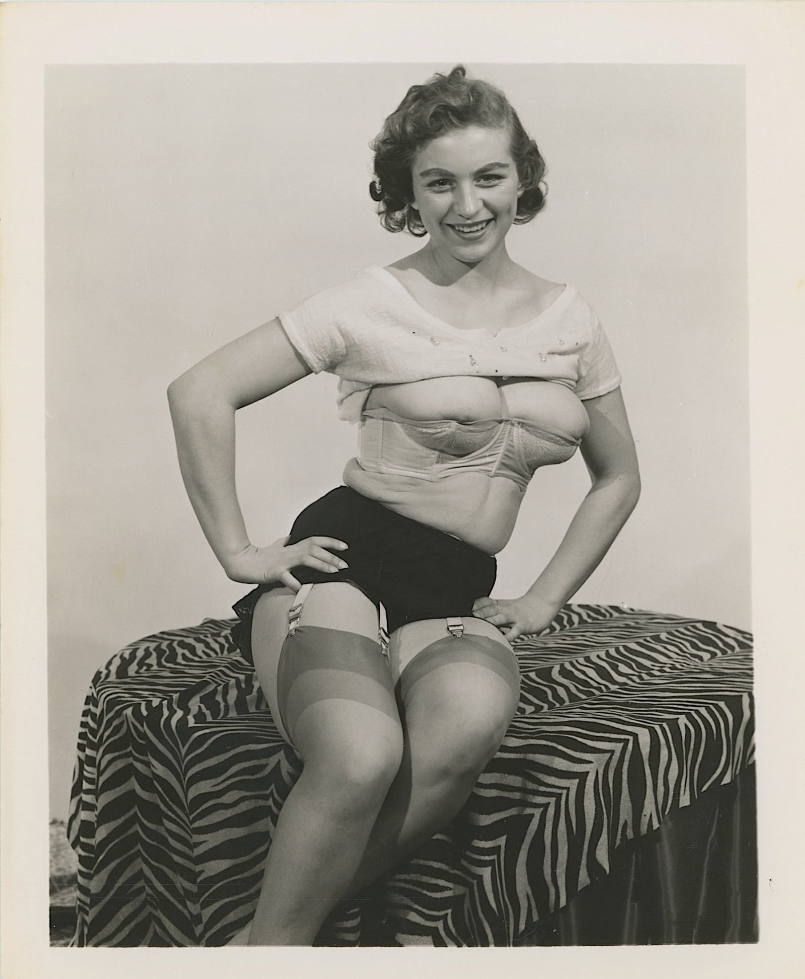 Vintage 1950s Pin-Up Photo Interior Model: The provenance of this lot is from a collector in RI. The dimensions are Approx. 5" 4". THIS IS A RESERVE AUCTION, and the final price will include a Buyer?s Premium. Please, view our full terms and c