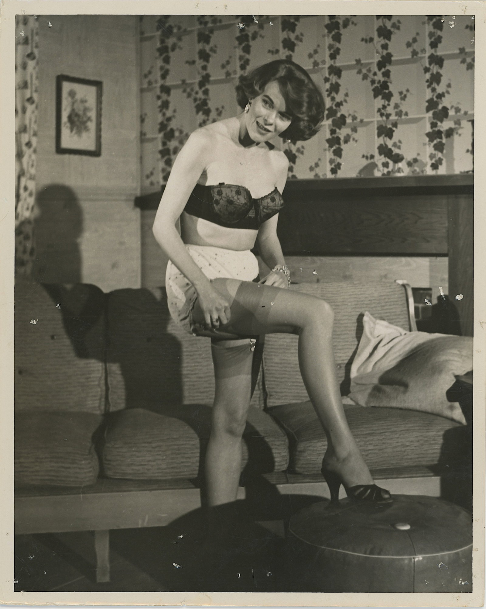 Vintage Photograph Ephemera of PIN UP MODEL: The provenance of this lot is from a collector in RI. The dimensions are Approx. 10" x 8". THIS IS A RESERVE AUCTION, and the final price will include a Buyer?s Premium. Please, view our full terms an