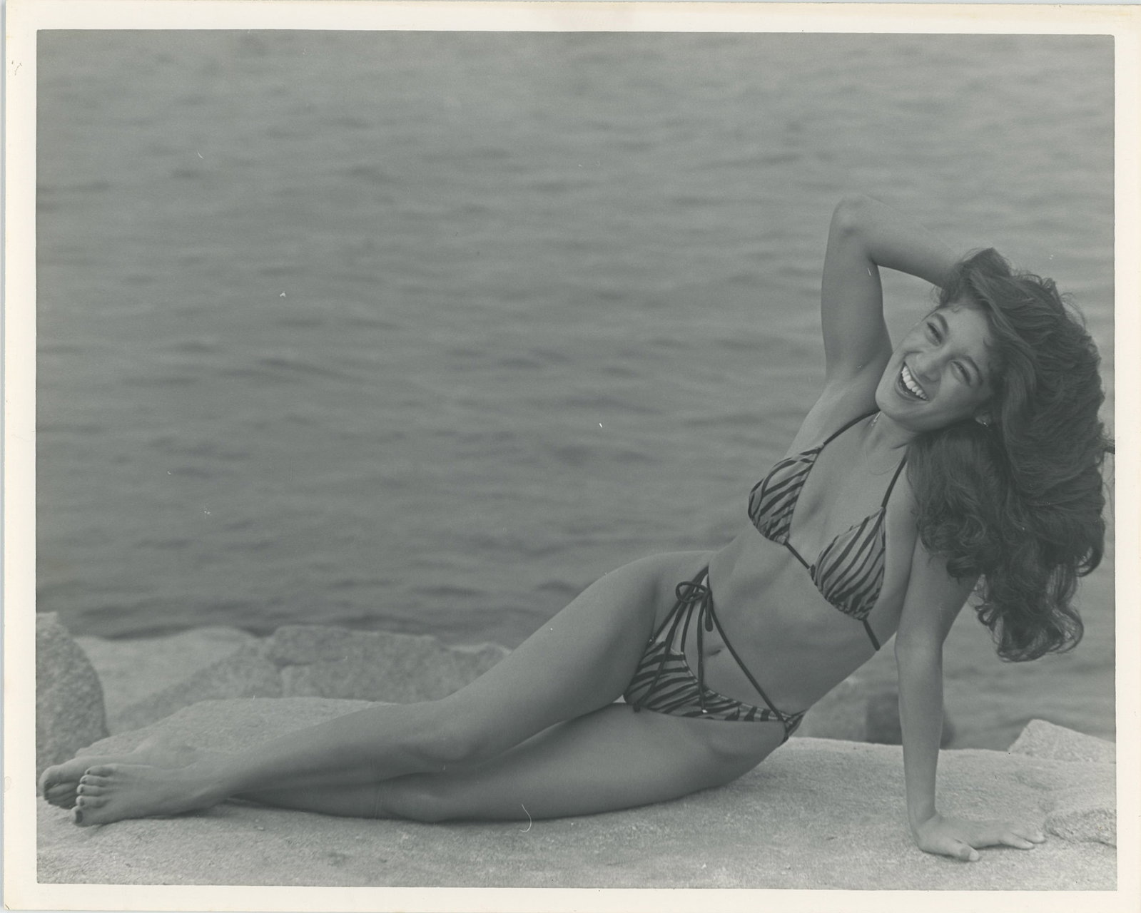 Vintage Photograph Ephemera of PIN UP MODEL: The provenance of this lot is from a collector in RI. The dimensions are Approx. 10" x 8". THIS IS A RESERVE AUCTION, and the final price will include a Buyer?s Premium. Please, view our full terms an