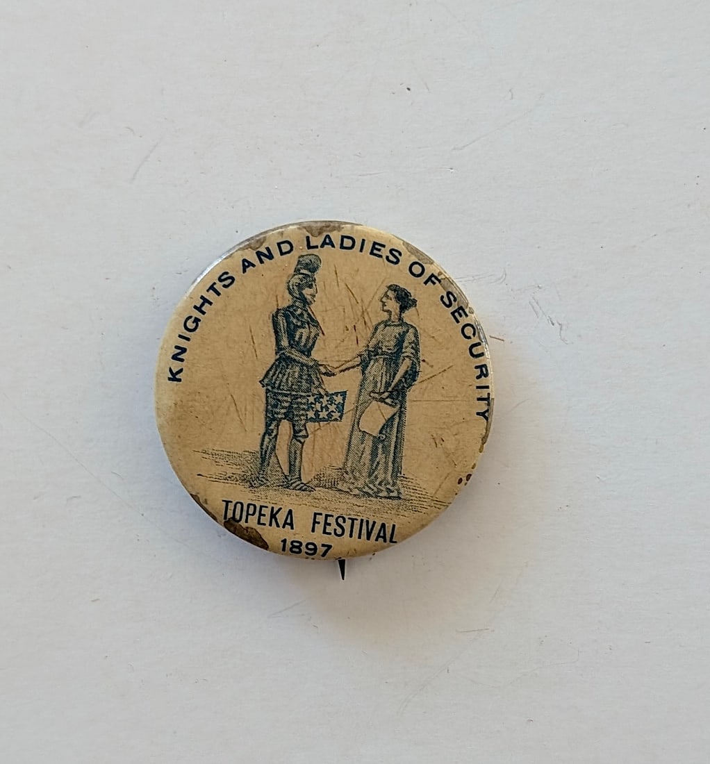 1897 "Topeka Festival" pinback button from the fraternal organization Knights and Ladies of Security: 1897 "Topeka Festival" pinback button from the fraternal organization Knights and Ladies of Security. The provenance of this item is from the inventories of Artelisted. We have included quality images