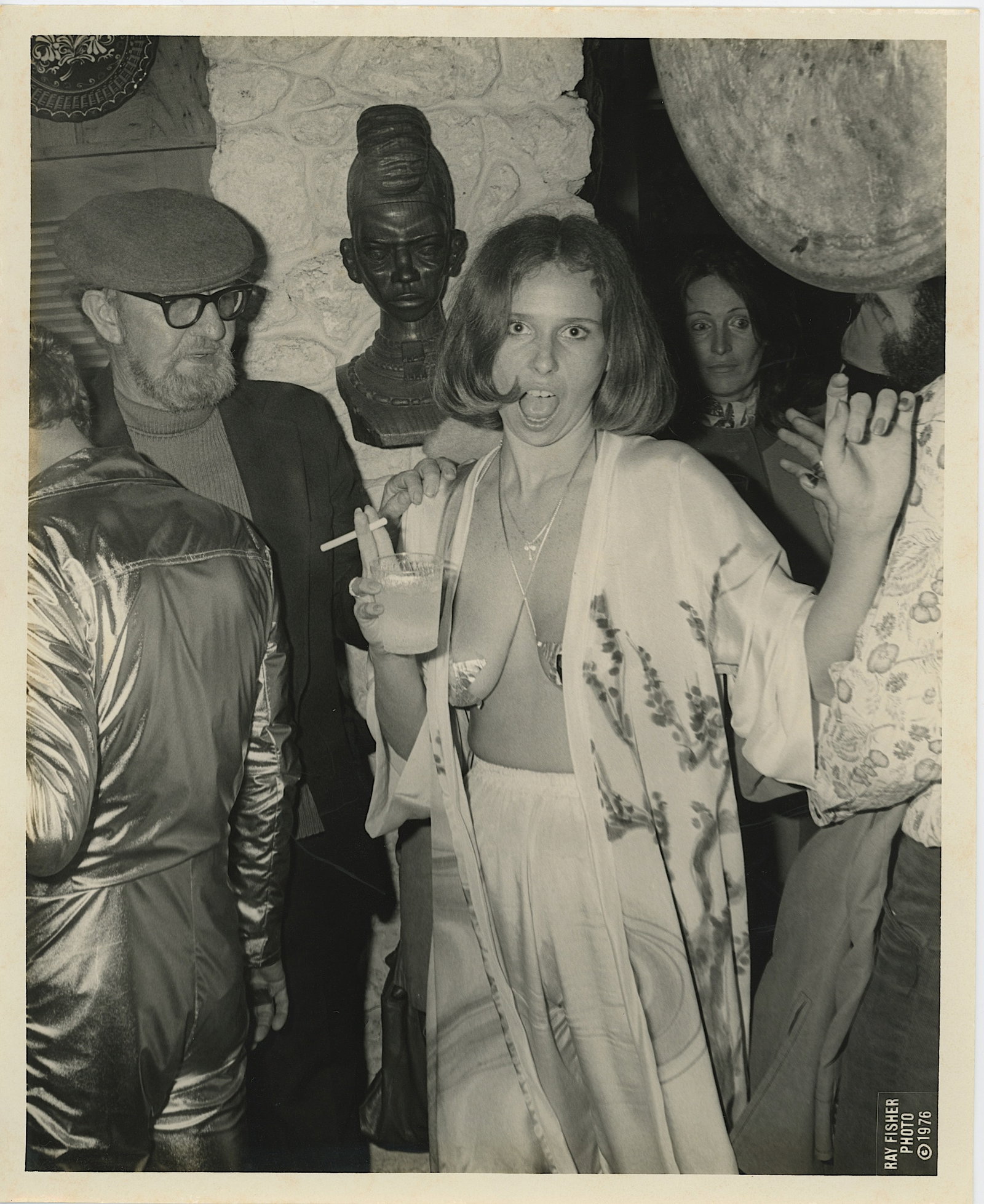 1973 Photo DERECK DANIELS PARTY in Miami by RAY FISHER: This photo is coming from the archives of Miami Photographer Ray Fisher. The dimensions are Approx. 10" x 8". Ray Fisher (b.1924) was born in Cleveland, Ohio but spent most of his childhood in New Yor