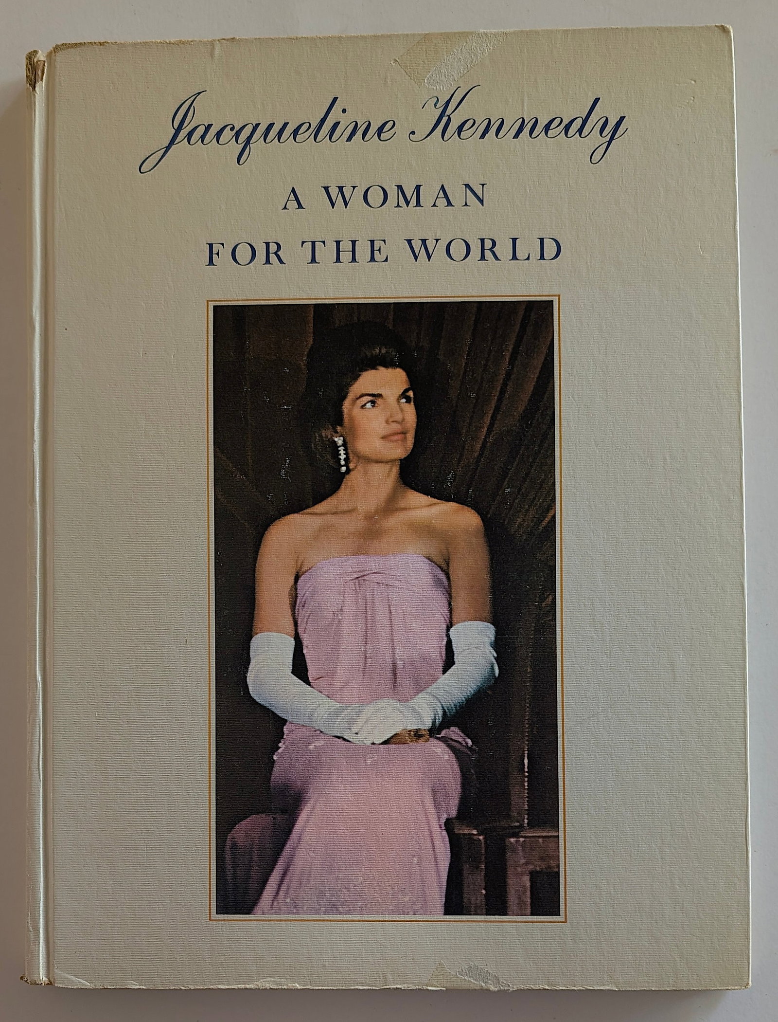 Vintage Book Jacqueline Kennedy: A Woman for the World, 1966: The provenance of this item is from the inventories of Artelisted. We have included quality images to show it's actual condition. THIS IS A RESERVE AUCTION, and the final price will include a Buyer?s 