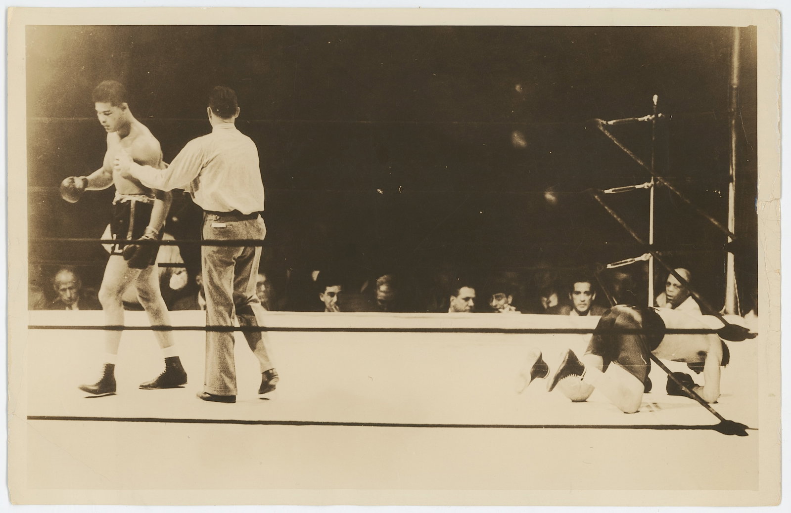 Scarce Historical Photo Boxing Joe Louis standing over a downed challenger Jack Roper (1 of 2)