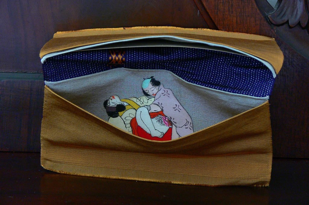 Rare WWII Japanese Erotica Shunga wallet: For sale a vintage WWII Occupation Japanese erotica cloth wallet in original box and in wonderful condition. Dimensions about 7" x 4". Provenance Admiral Crawford Estate Occupation.