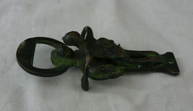 Brass Old erotic beer bottle opener Kamasutra Design: Dimensions about 4' long x 1.5 wide.