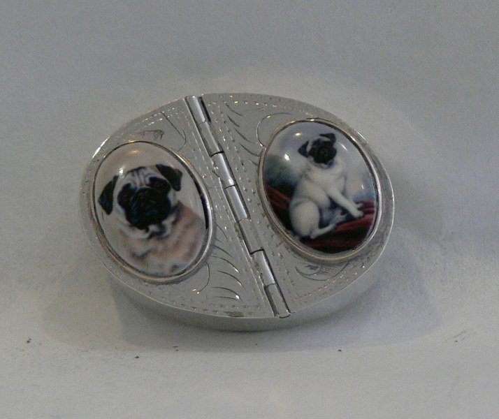Silver double pill box with dogs: Piece is marked. Dimensions are about 1.50" x 1.15" x 0.50"