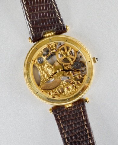 18k Gold Universal Geneve Men's Wristwatch: Limited edition # 5/50, "Skeleton" movement watch.
