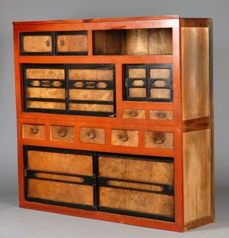 Asian Tansu Cabinet: Rectangular top over and assortment of burl wood doors and drawers, red painted decoration. Height 69 inches, width 6 feet 2 inches, depth 20 inches.