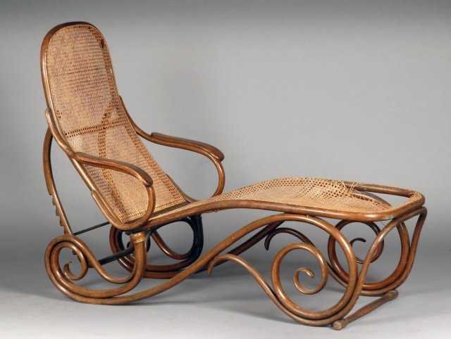 Thonet Bentwood Chaise: Adjustable with caned back and seat, bent wood frame. Height 44 inches, length 60 inches, width 25 inches. Ref. Thonet 1904 Illustrated catalog.