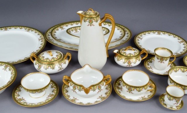 Set of French Dinnerware: Approximately 150 pieces.