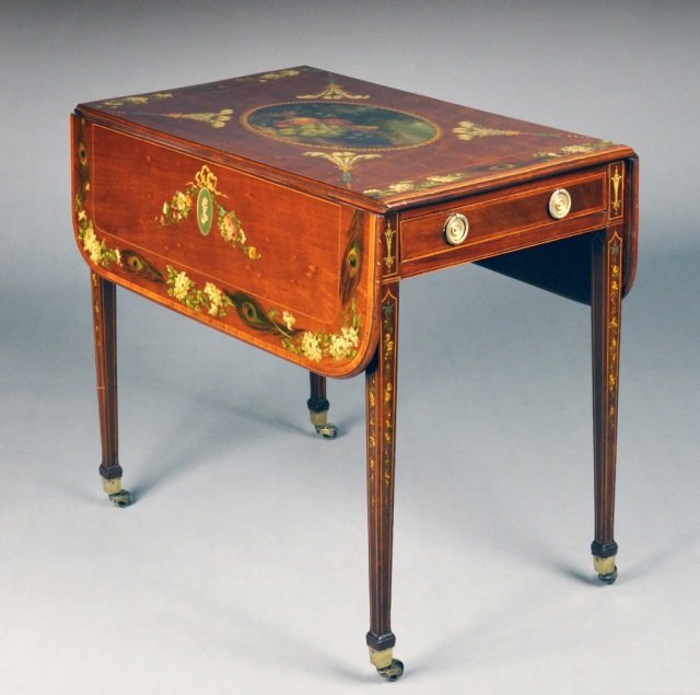 English Mahogany Hepplewhite Pembroke Table: Early 19th century. Rectangular top with two drop leaves, over a single drawer, raised on four square tapered legs, brass castors. Mahogany and satinwood, with painted floral and peacock decoration. H
