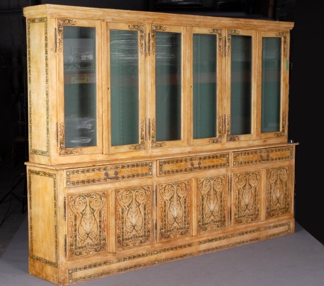 Edwardian Style Painted Deux Corps Bookcase: Rectangular top over six glass panel doors, above three two-door cupboards. Height 6 feet 5 inches, width 8 feet 6 inches, depth 17 inches.