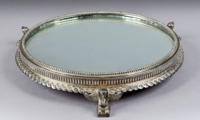 French Silver Plated Mirrored Plateau: Late 19th / early 20th century. Egyptian revival style. Height 2 1/2 inches, diameter 14 inches.