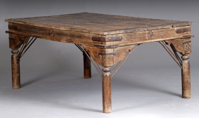 Colonial Anglo-Indian Hardwood Table: Rectangular top with metal mounted accents, round turned legs. Height 30 inches, width 6 feet, depth 45 inches.