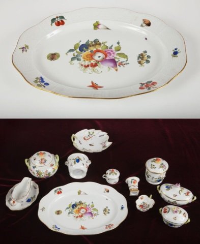 Herend Hand Painted Partial Dinner Service: Painted fruit and leaf motif. Approximately 157 pieces including eight dinner plates, twenty-nine cups, thirty saucers, eight bowls, eight luncheon plates, twelve soup bowls, and twelve bouillon.