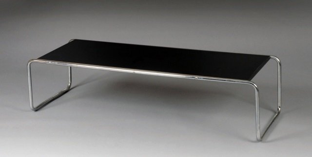 Knoll Modern Coffee Table: Rectangular top, tubular chrome frame. Height 14 inches, width 54 inches, depth 19 inches.