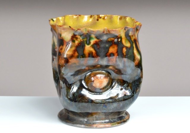 George Ohr (American, 1857-1918) Ceramic Vessel: Glazed ceramic vessel. Stamped on bottom. Height 3 1/2 inches.