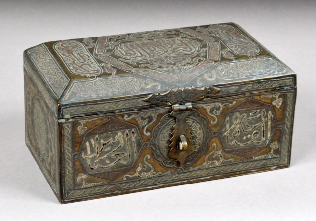 Islamic Metal Overlay Casket: 19th century. Rectangular with wood parquetry inlaid interior. Height 4 1/2 inches, width 9 inches, depth 5 inches.