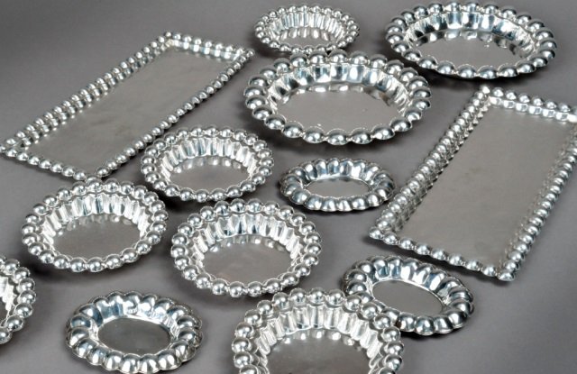 Assorted Group of Continental Silver Table Article: Including two rectangular trays, ash receivers, nut dishes, etc. Approximately 43 oz.