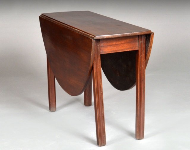 English Chippendale Mahogany Drop Leaf Table: 18th century. Rectangular top flanked by two D shaped drop leaves, on four square legs. Height 28 inches, width (extended) 52 inches, depth 41 1/2 inches.