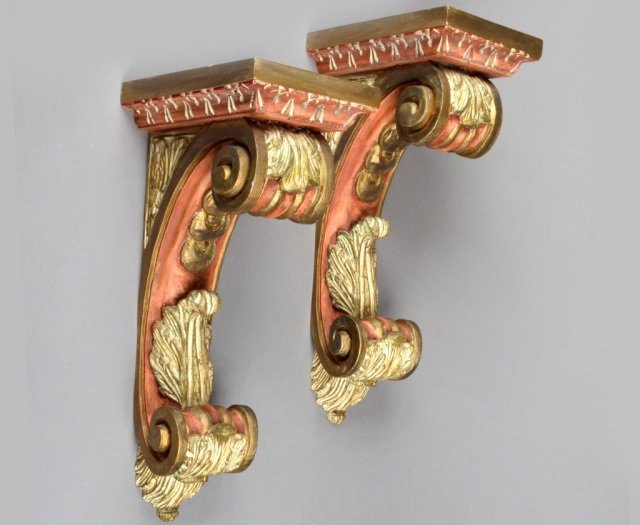 Pair of Neoclassical Style Wall Brackets: Height 19 inches.