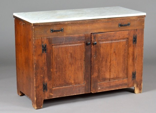 Marble Top Buffet: Rectangular white marble top above a single long drawer and a two door cabinet. Height 31 inches, width 44 inches, depth 20 inches.