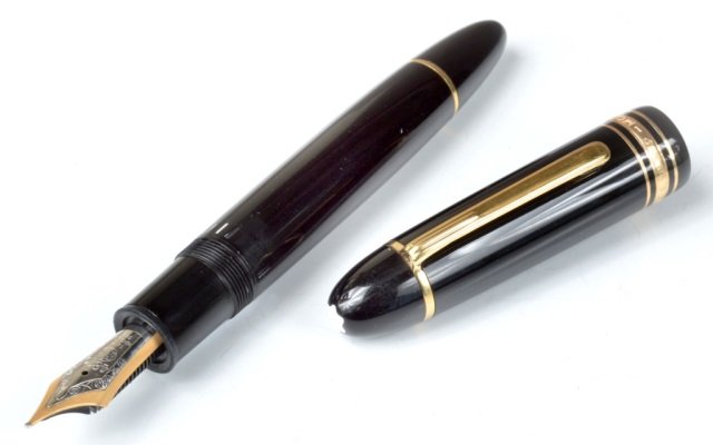 Montblanc Meisterstuck No. 149 Fountain Pen: Black resin barrel and cap with gilt trim. 14K two toned gold nib #4810.