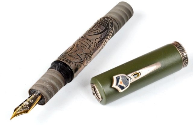 Krone General George S. Patton Fountain Pen: Fashioned from Damascus steel, embellished by a carved barrel band and the cap decorated by Patton's four stars and the clip bearing the 7th Army patch. Medium 18K two tone rhodium plated gold nib. In