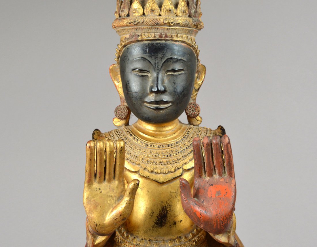 Gilt Wood Figure of Buddha: Modeled standing, ebonized face. Height 34 inches.