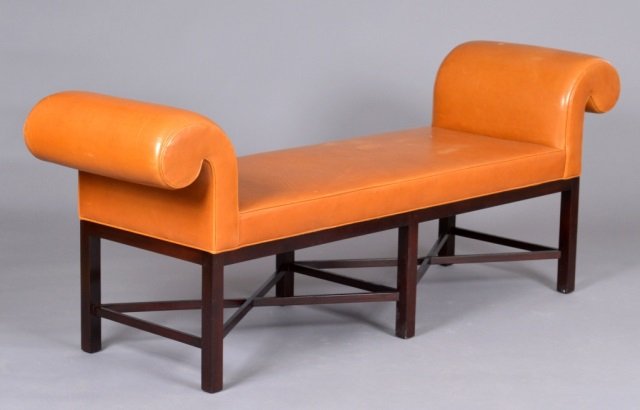 Leather Upholstered Window Bench: Rectangular seat cushion with outscrolled arms, mahogany base. Height 29 inches, width 6 feet 3 inches, depth 21 inches.