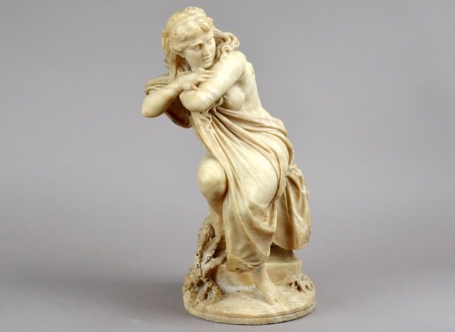 Alabaster Figure of a Woman: Modeled sitting. Height 24 inches. (As is condition).