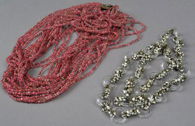 Two Lady's Costume Necklaces: One in the manner of Miriam Haskell. One, length 29 inches, the other, 18 inches.
