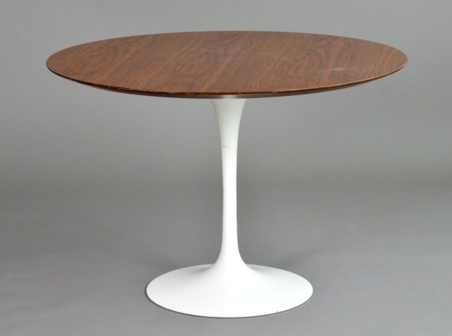 Mid Century Modern Pedestal Table: Designed by Eero Saarinen for Knoll. Circular top on white pedestal base. Height 28 inches, diameter 42 inches.