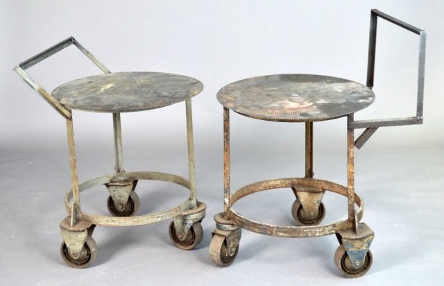Pair of Mid Century Modern Steel Rolling Carts: Industrial steel. Height 39 1/2 inches, width 26 inches, depth 32 inches.