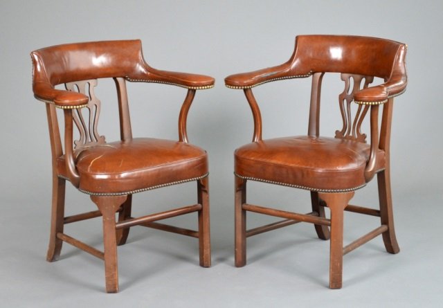 Set of Seven Kittinger Georgian Style Armchairs: Leather upholstered. Height 34 1/2 inches, width 29 inches, depth 21 inches.
