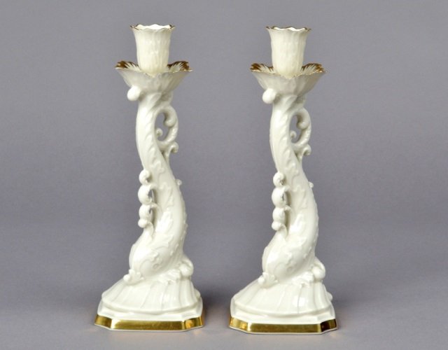 Pair of Lenox Porcelain Candlesticks: Decorated with gilt accents in dolphin motif. Height 10 inches.
